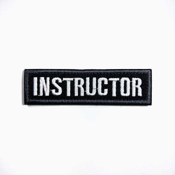 Instructor embroidered tactical patch with hook and loop tape for Book covers, bags, vest, tactical patch. 3.75 x 1 inches.